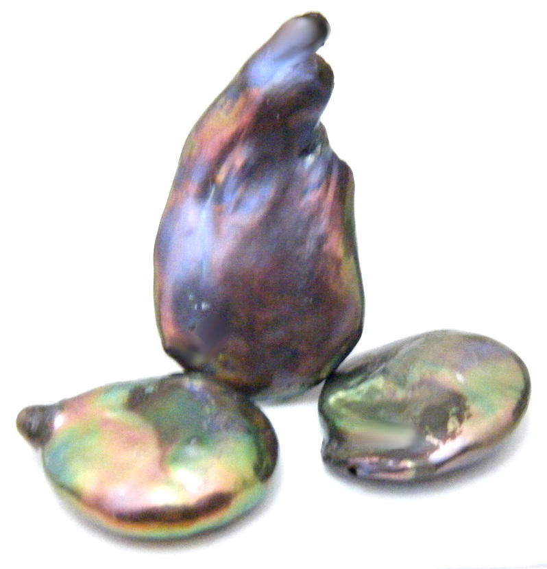 Black Discs and Pendant Lumps of Nacre